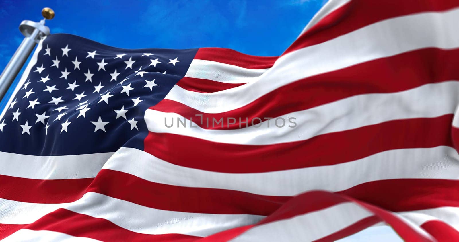 close up view of the american flag waving in the wind. Selective focus. Democracy, independence and election day. Patriotic symbol of American pride. Selective focus