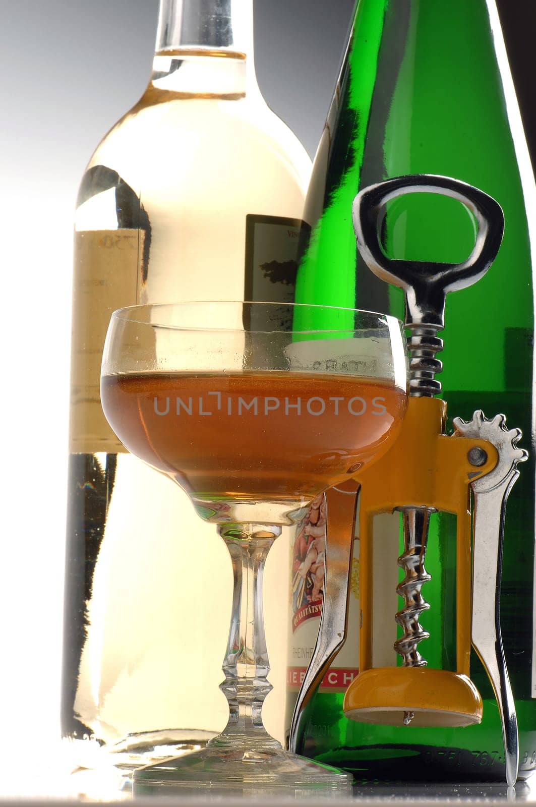 bottles with wine on a white background