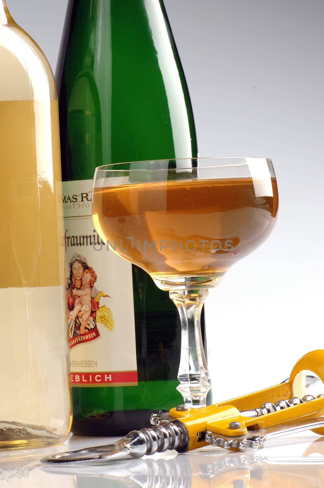 bottles with wine on a white background