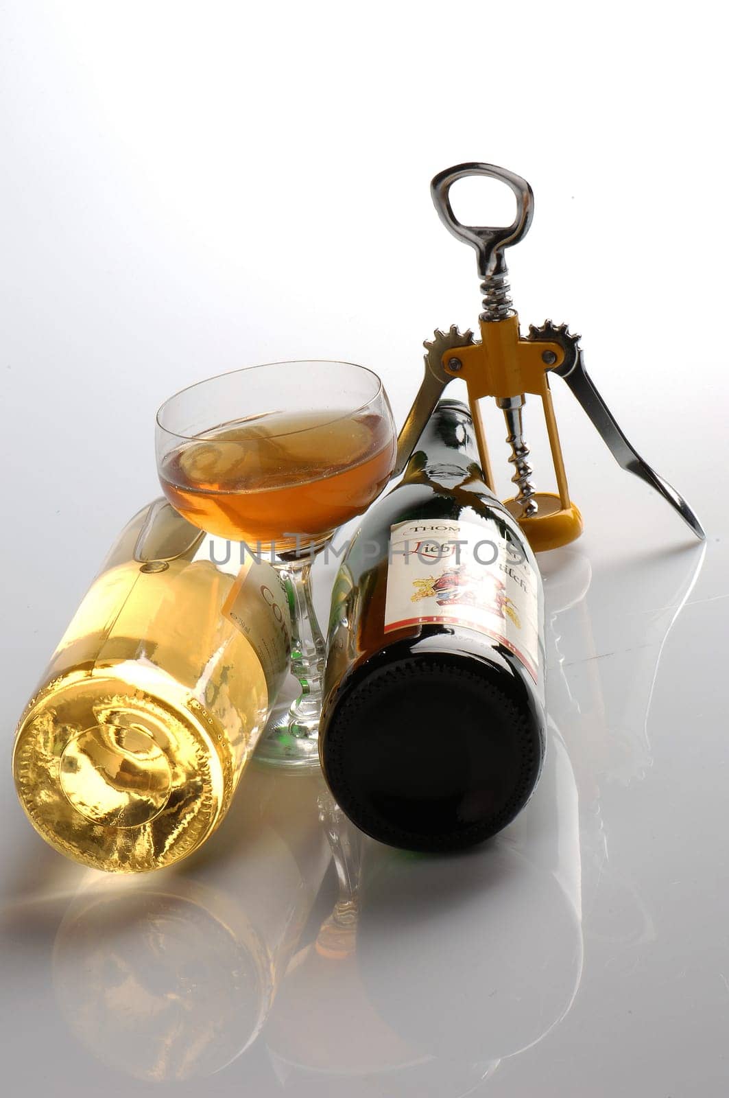 bottles with wine on a white background