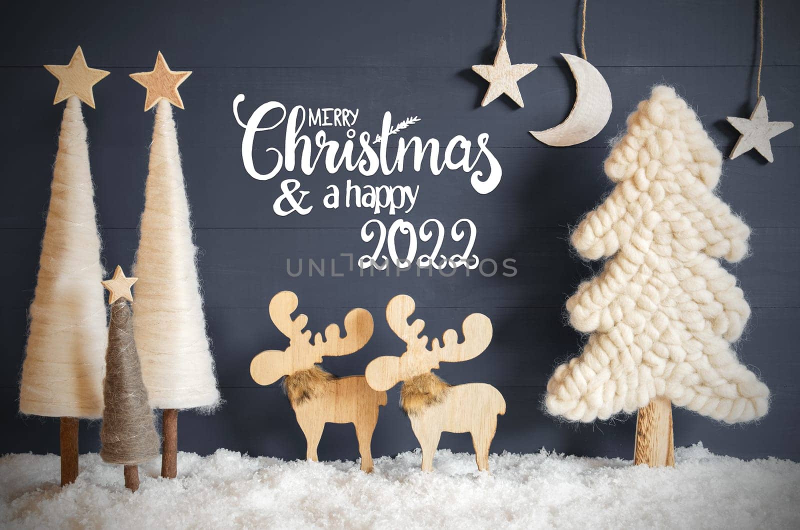 English Calligraphy Merry Christmas And Happy 2022 On Black Background With Snow. Decoration Like Christmas Trees And Moose. Moon And Stars For Night Atmosphere