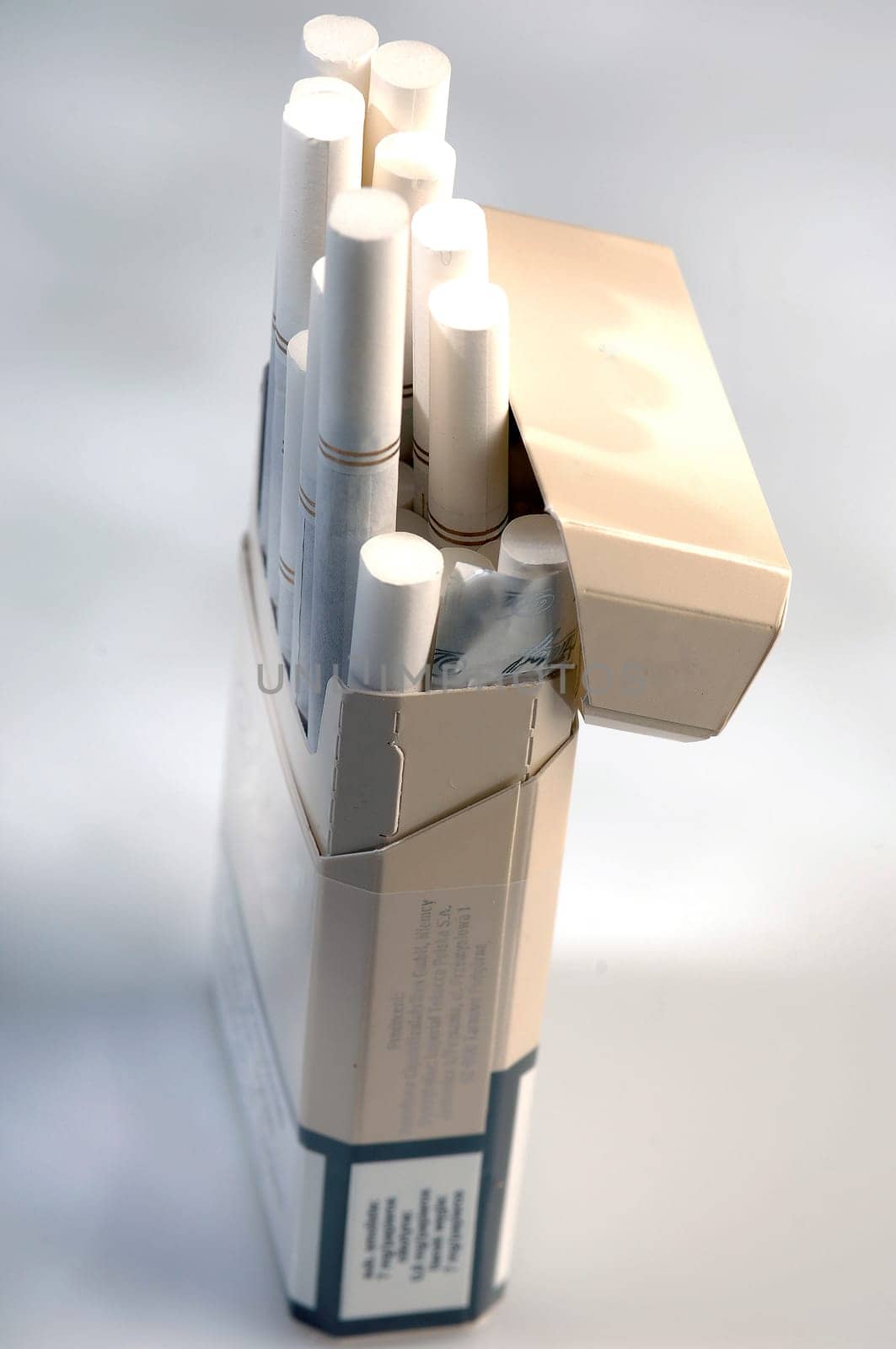 different types of cigarettes on a white background