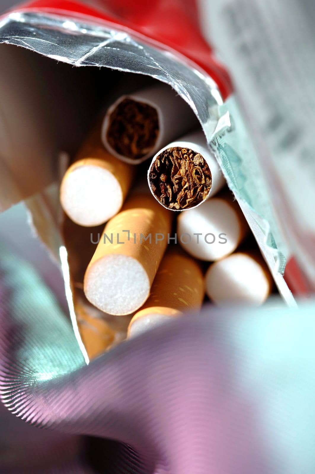 different types of cigarettes on a white background