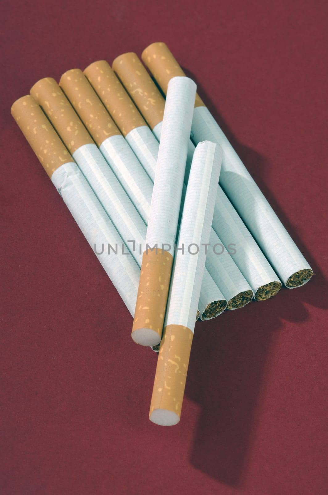 different types of cigarettes on a white background