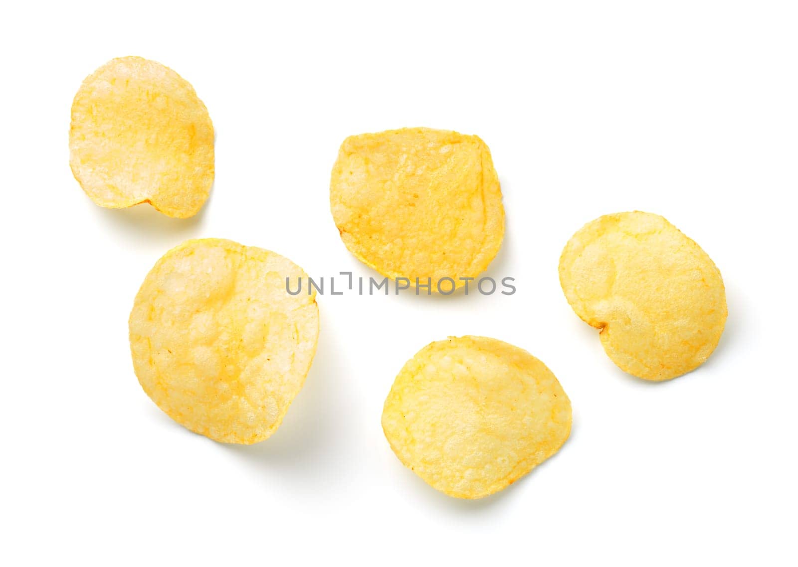 Potato chips isolated on white background. Top view