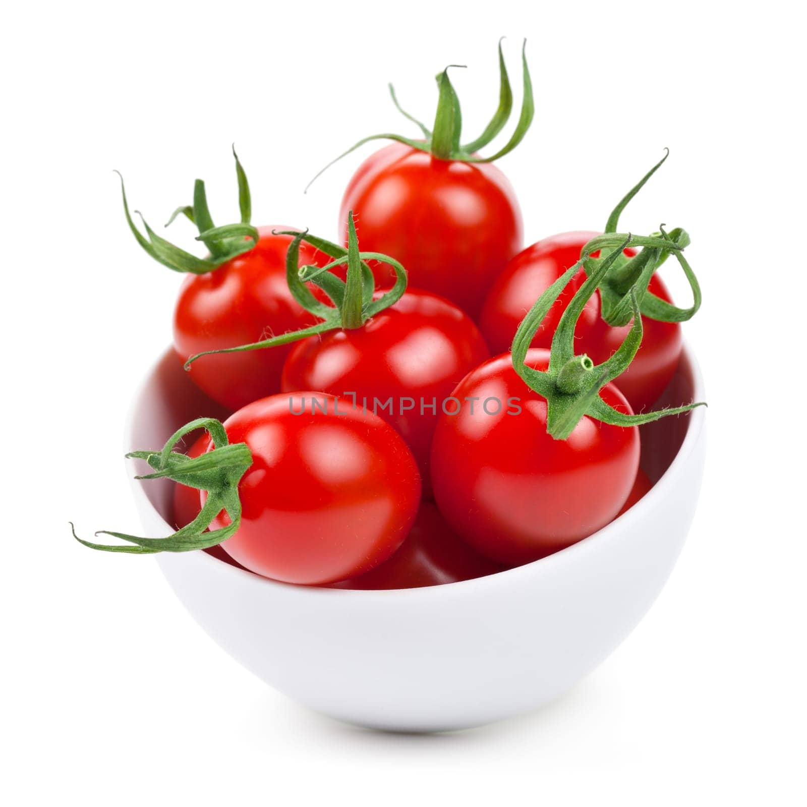 Cherry tomatoes in white bowl isolated over white background