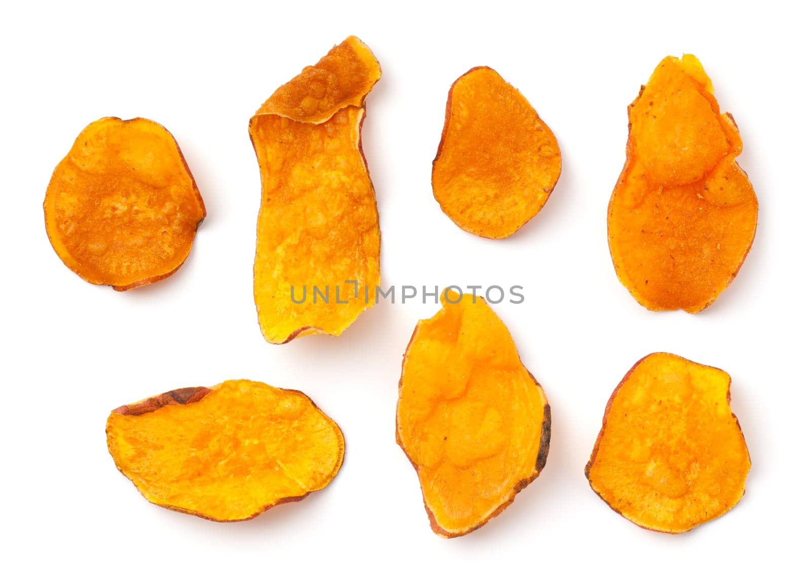 Set of sweet potato chips isolated on white background. Flat lay. Top view