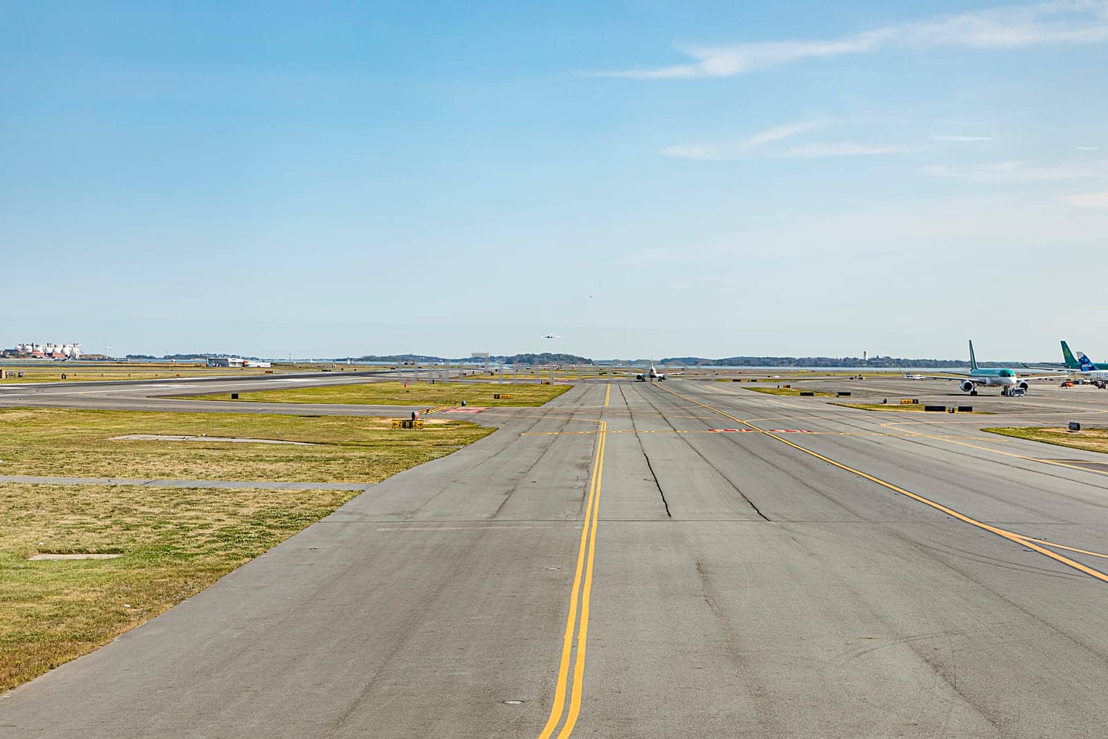 runway with aircraft at Boston international airport, USA