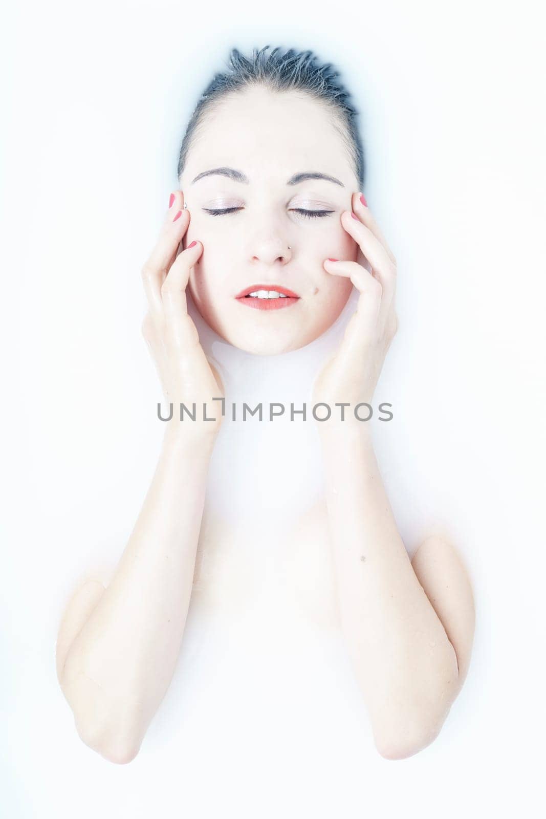 young woman in the bathtub at wellness