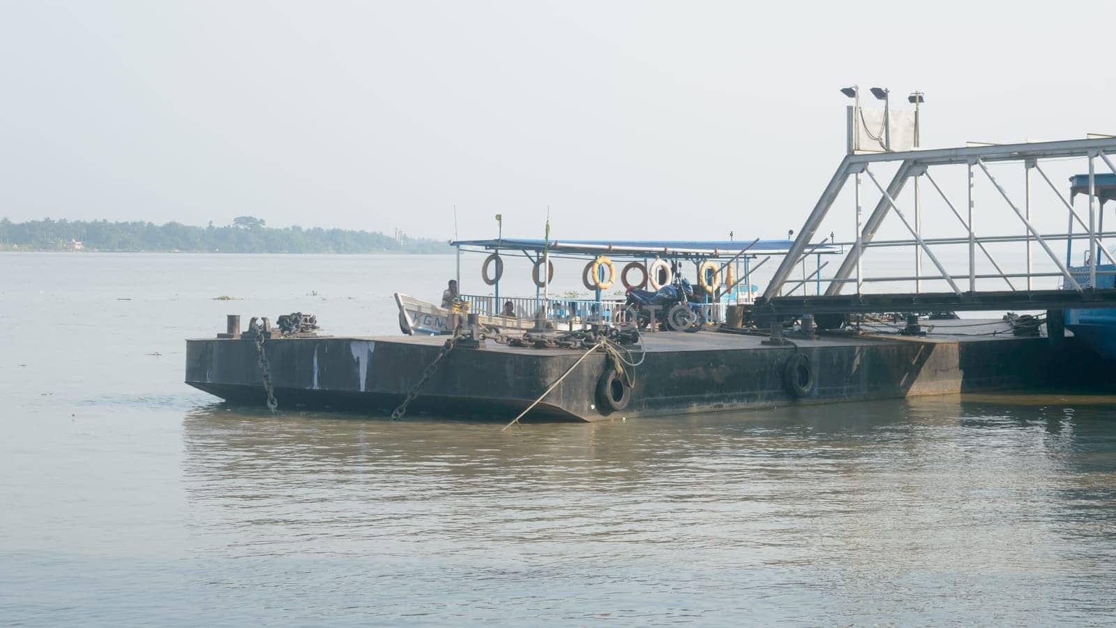 Ganges Riverside Ferry Ghat. Ferry Service - WBTC - West Bengal Transport Corporation Uluberia Howrah South Asia Pacific. 23 October 2021