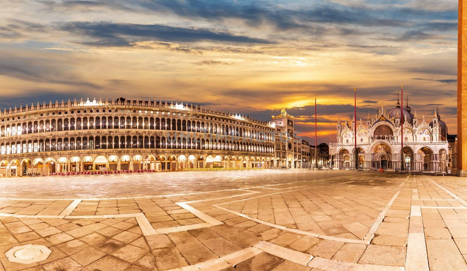 Basilica San Marco and the Clocktower in Piazza San Marco at sunrise, Venice, Italy.