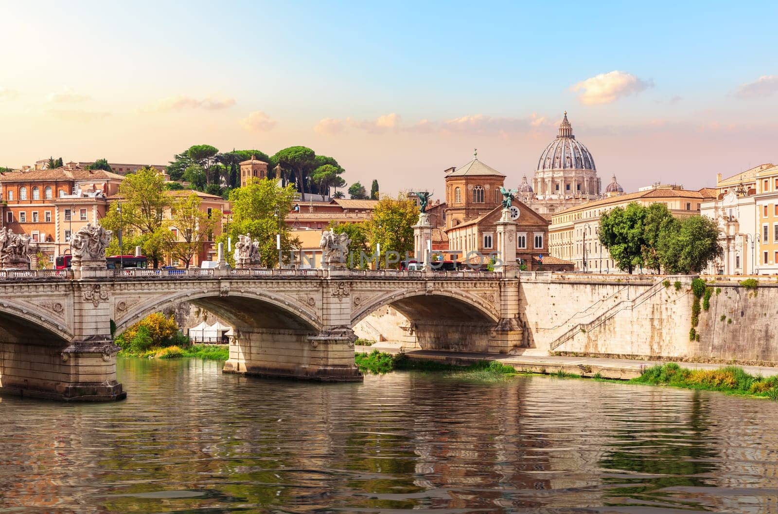 Bridge Vittorio Emanuele II, the Tiber River and St Peter's Cathedral, Rome, Italy.