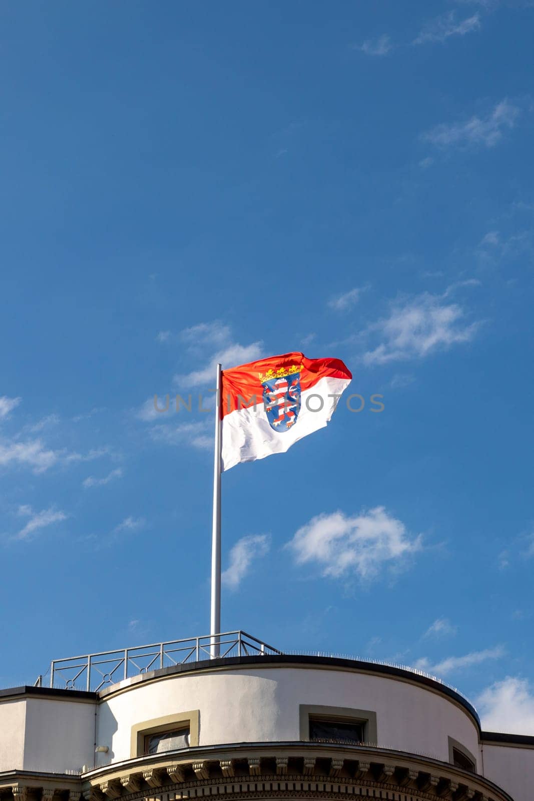 flag of Hesse under blue sky in Germany, Wiesbaden