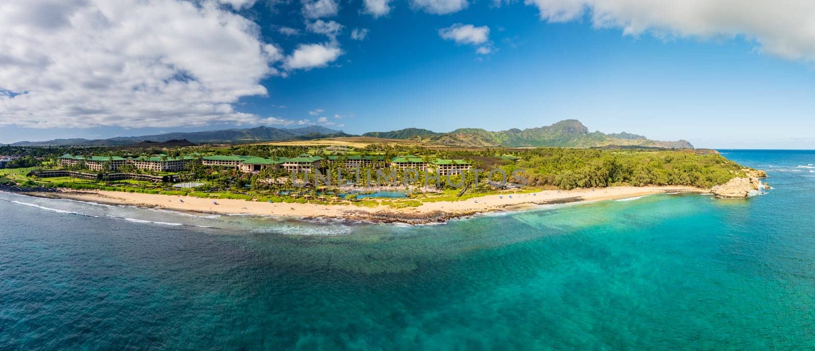 Koloa, Kauai - 2 February 2025: Panoramic aerial view of the Grand Hyatt Kauai and its picturesque beachfront location