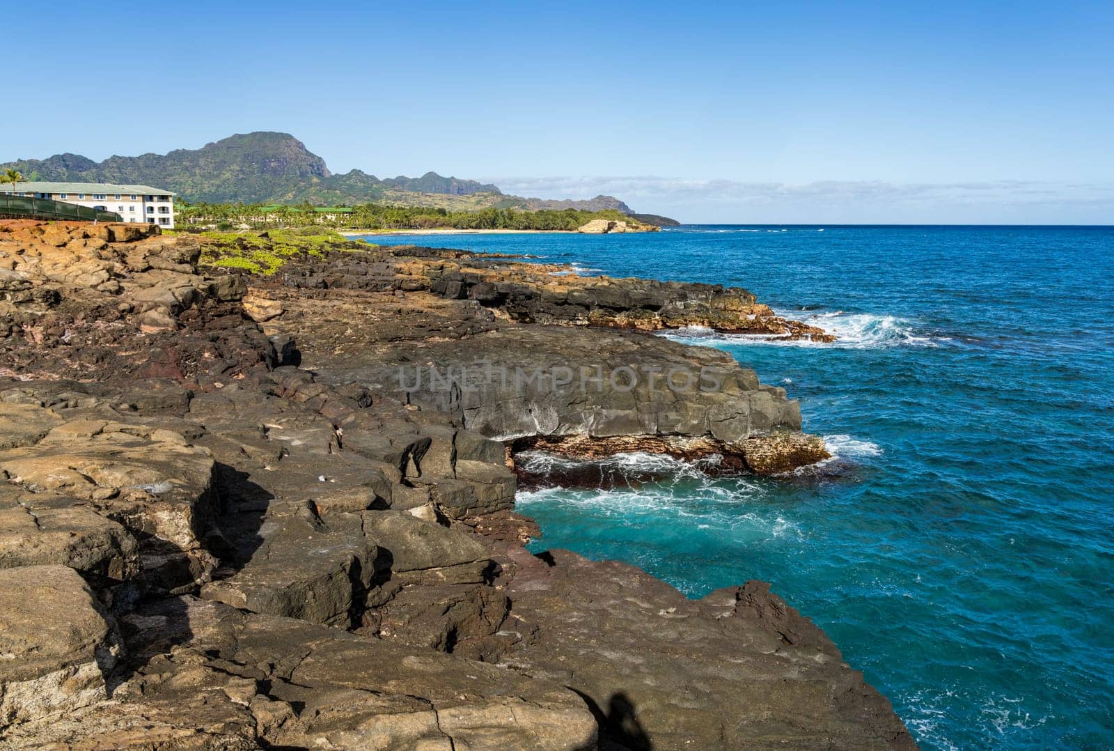 Aerial view of Keoniloa Bay and Shipwreck beach in Koloa on south coast of Kauai