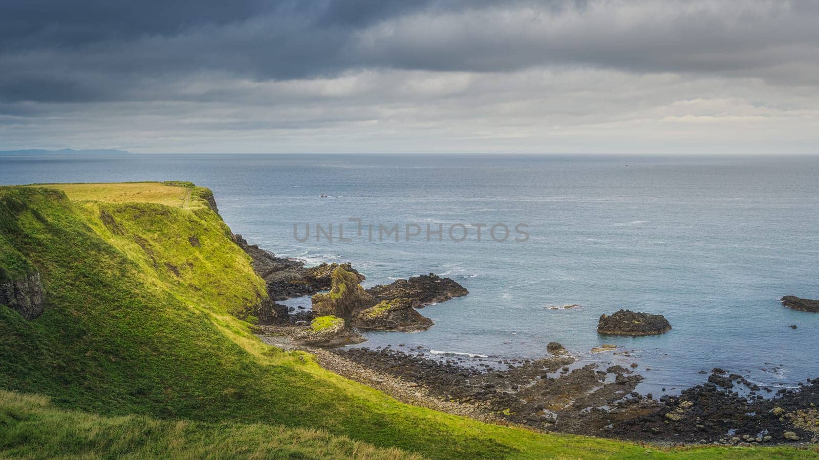 Rock formations of Giants Causeway, seen from the top of the cliff, part of Wild Atlantic Way and UNESCO world heritage, located in Northern Ireland