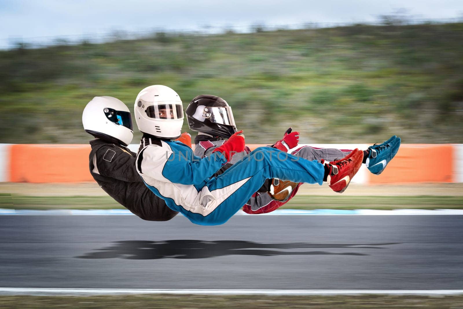 Concept image of racing drivers in racing position with complete gear