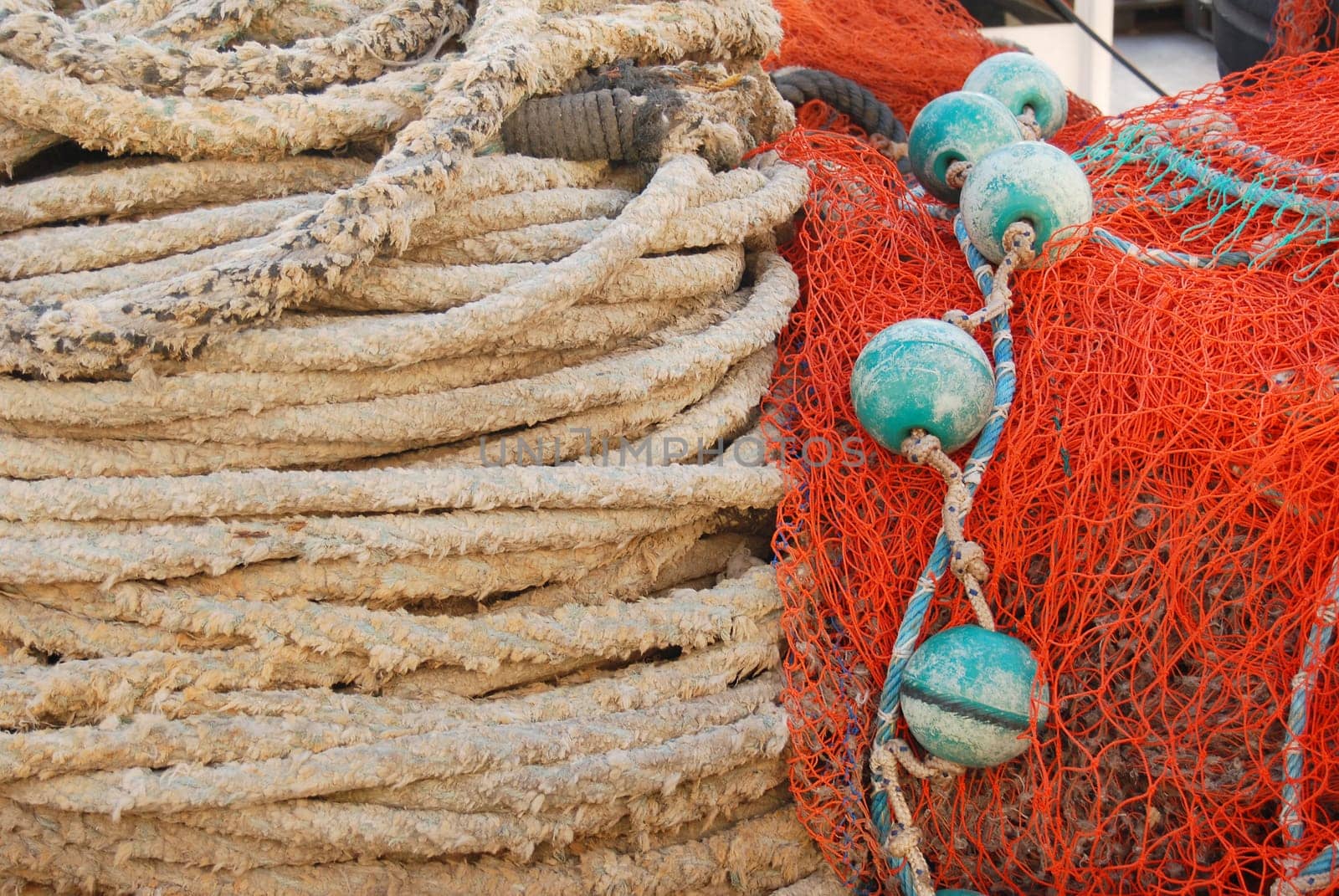 Fishing net and rope on the harbar, colorful image, fishing industry, mediterranean sea, port Tel Aviv Yafo, Israel