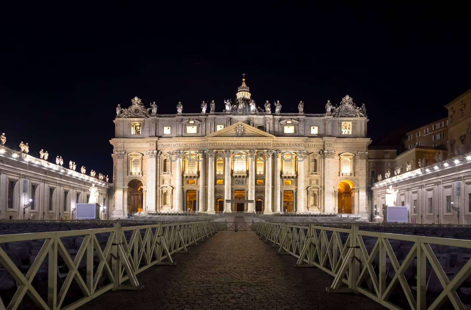 Papal Basilica of Saint Peter in  Vatican City illuminated by night, designed by Michelangelo and Bernini