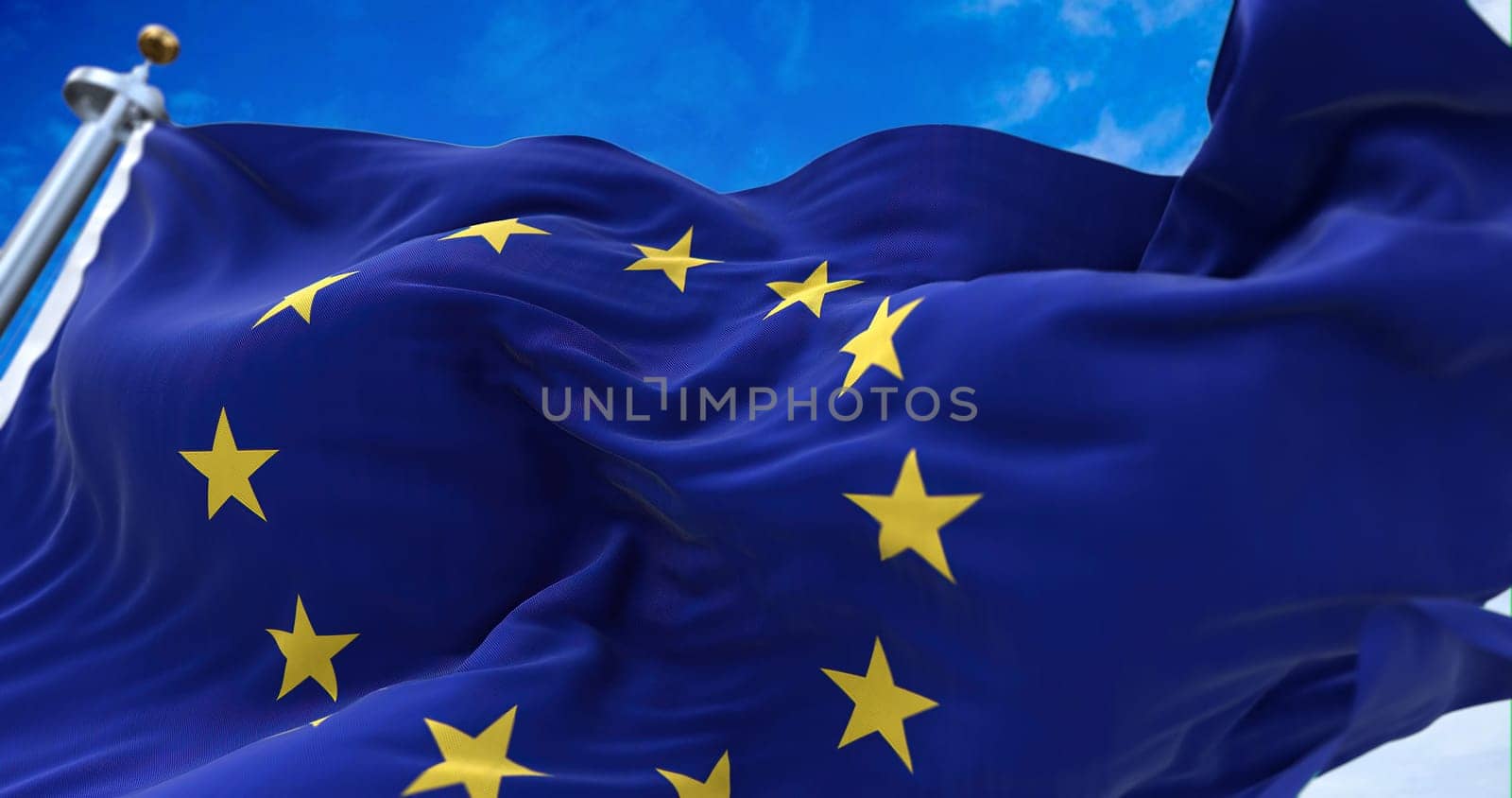 The flag of The European Union flapping in the wind. Economic and finance Community. Politics and Economy. Transnational political government