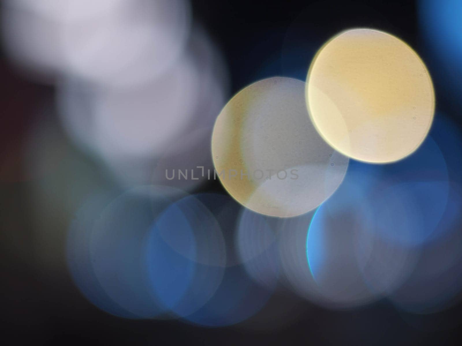 Colorful blur light hexagon bokeh background. Abstract Christmas festival defocused background.