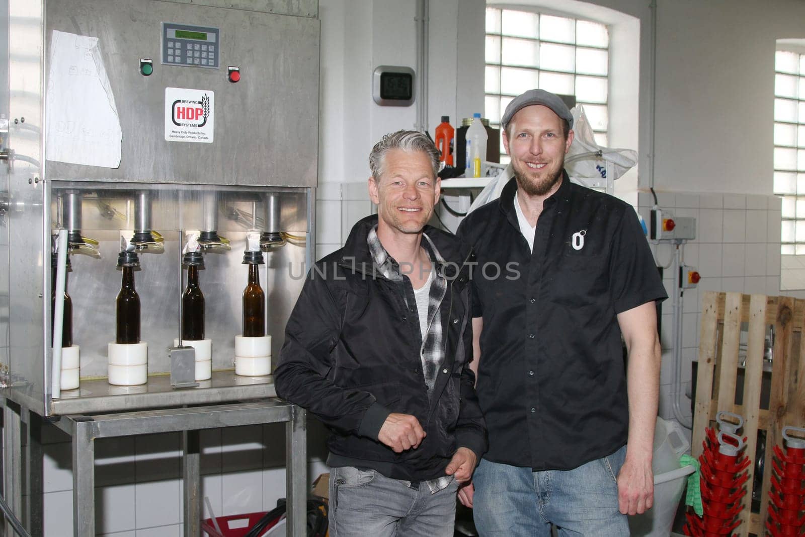 Master brewer Simon Siemsgluess,Steffen Wink,presenter for the RTL NITRO magazine BEEF! The Tv Magazine,Hamburg,20.04.2015