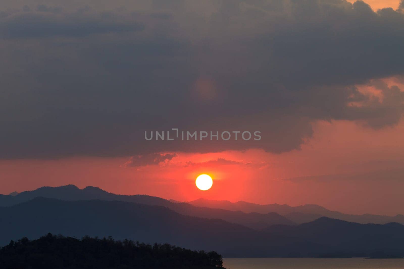 Sunset at lake, Kaeng Krachan Dam on Silhouette