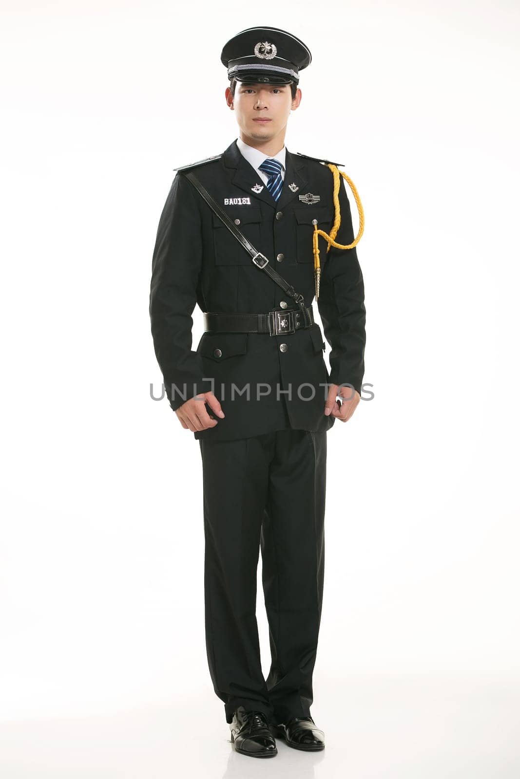 Create all kinds of work clothes policeman stands in front of a white background