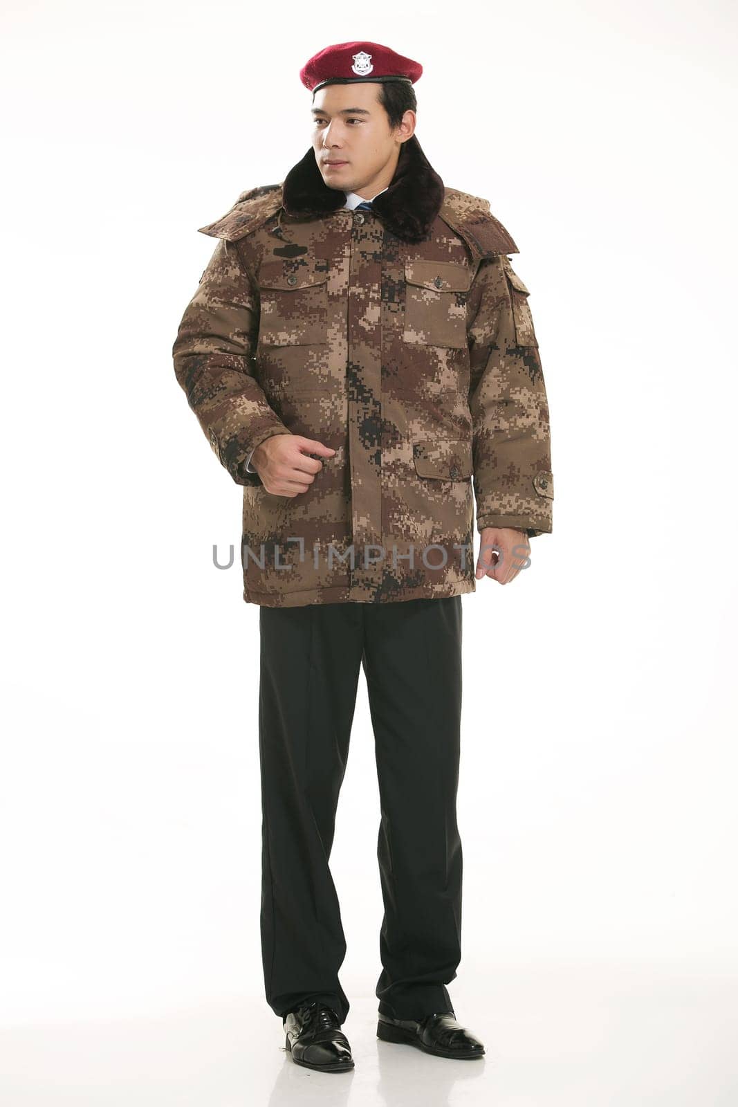 Create all kinds of work clothes policeman stands in front of a white background