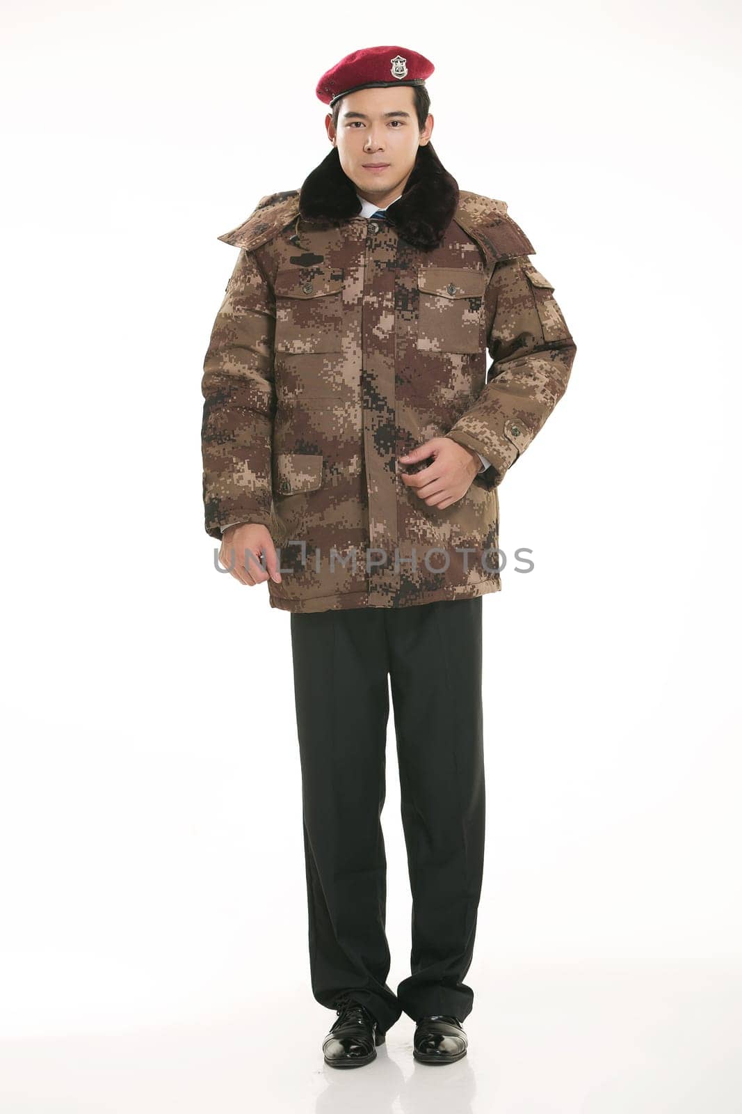 Create all kinds of work clothes policeman stands in front of a white background