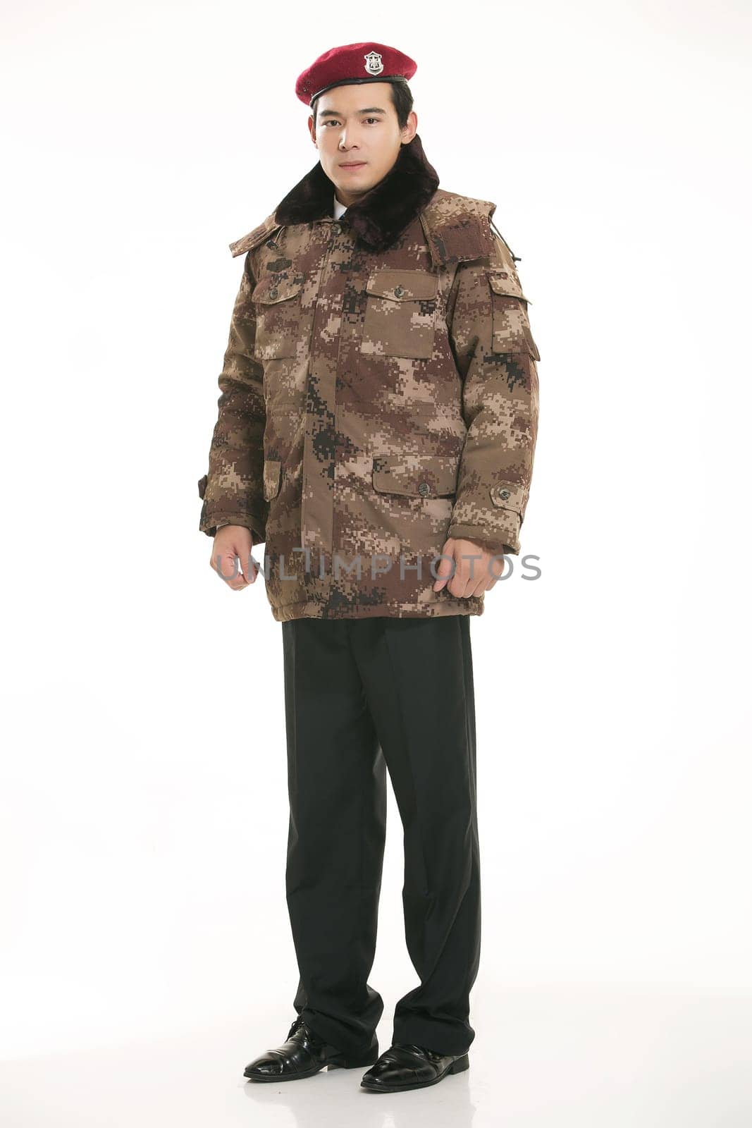 Create all kinds of work clothes policeman stands in front of a white background