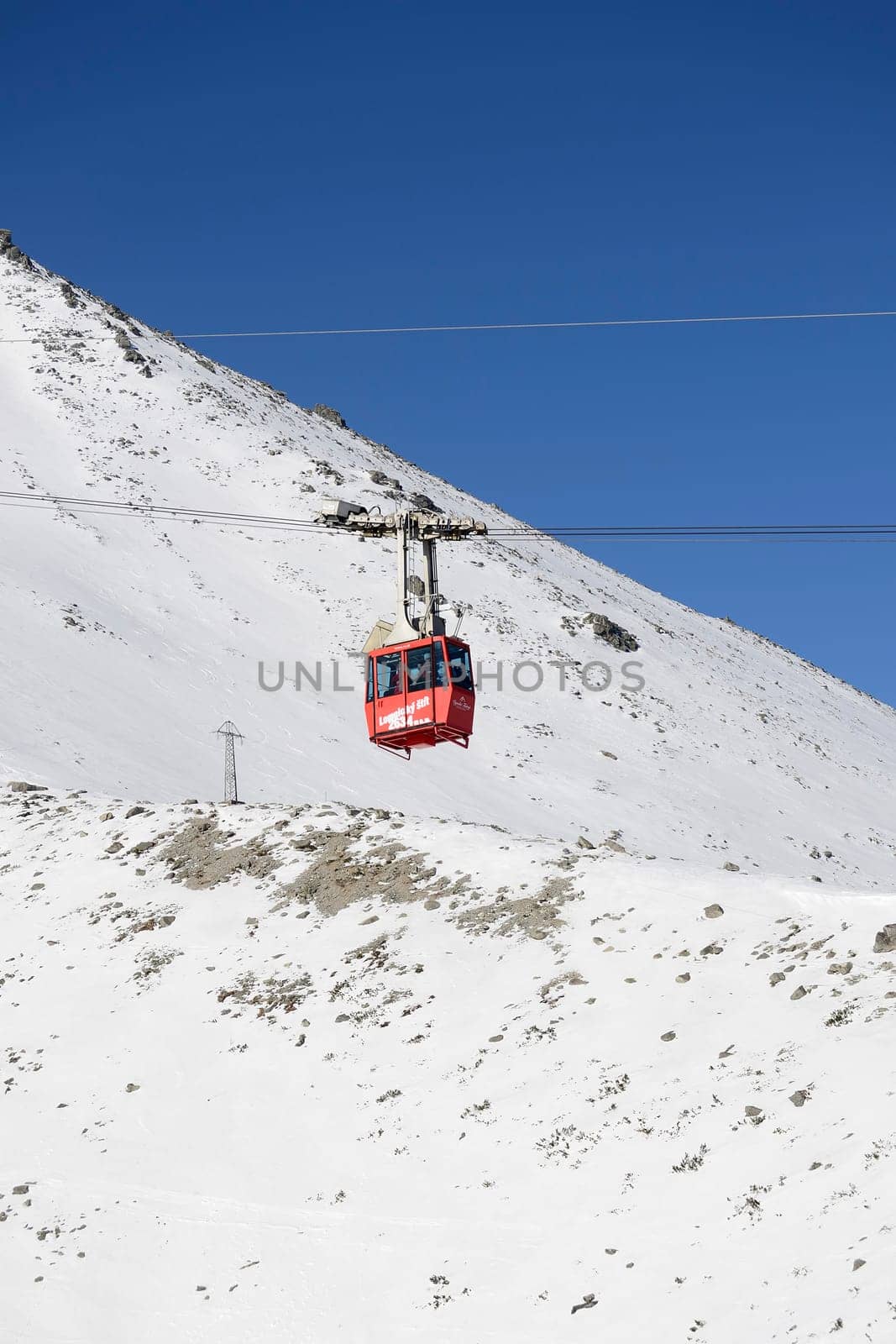 Mountains in winter with cable car