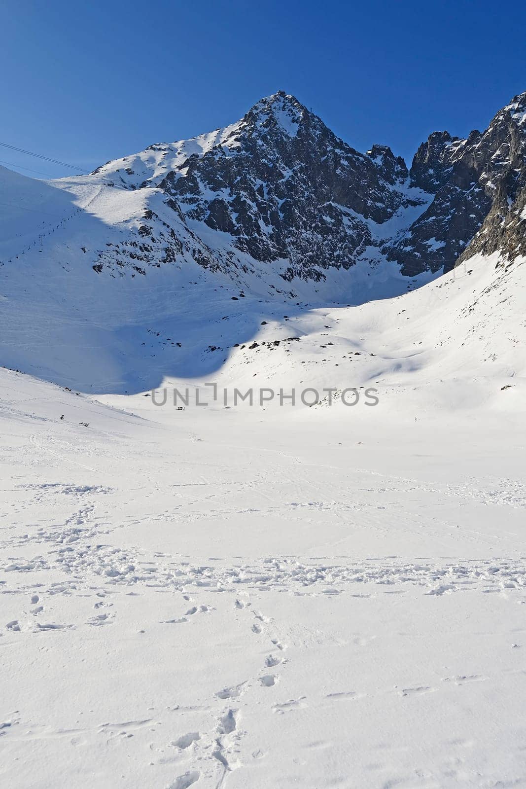 Mountains in winter with cable car