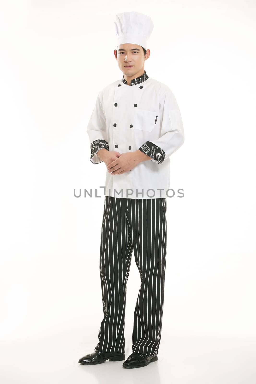 Wearing all kinds of clothing chef dietitian in front of white background