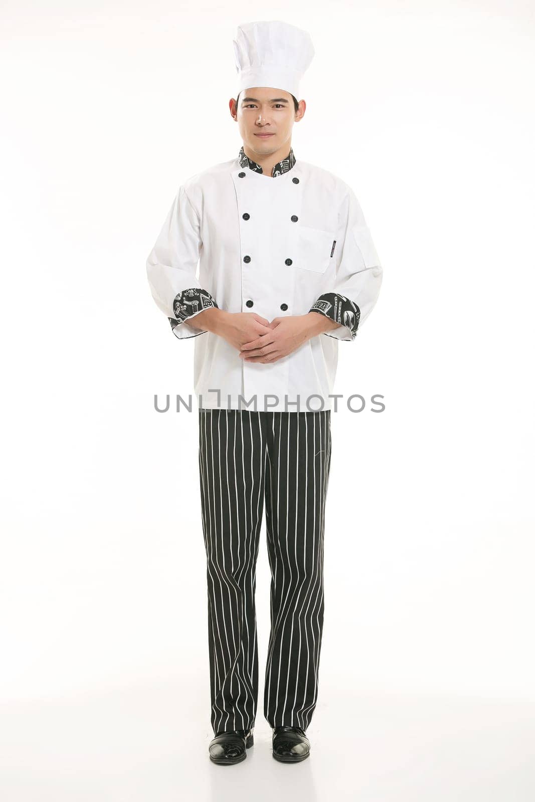 Wearing all kinds of clothing chef dietitian in front of white background