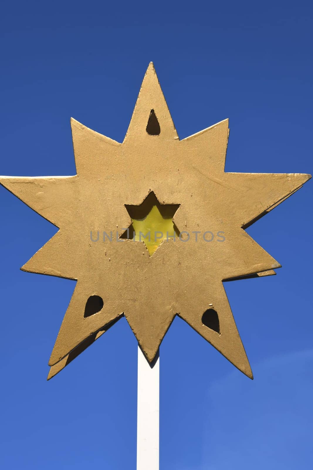 A star indicated the way to Bethlehem for the Three Wise Men. Carol singers go from house to house collecting donations for projects in poorer countries.