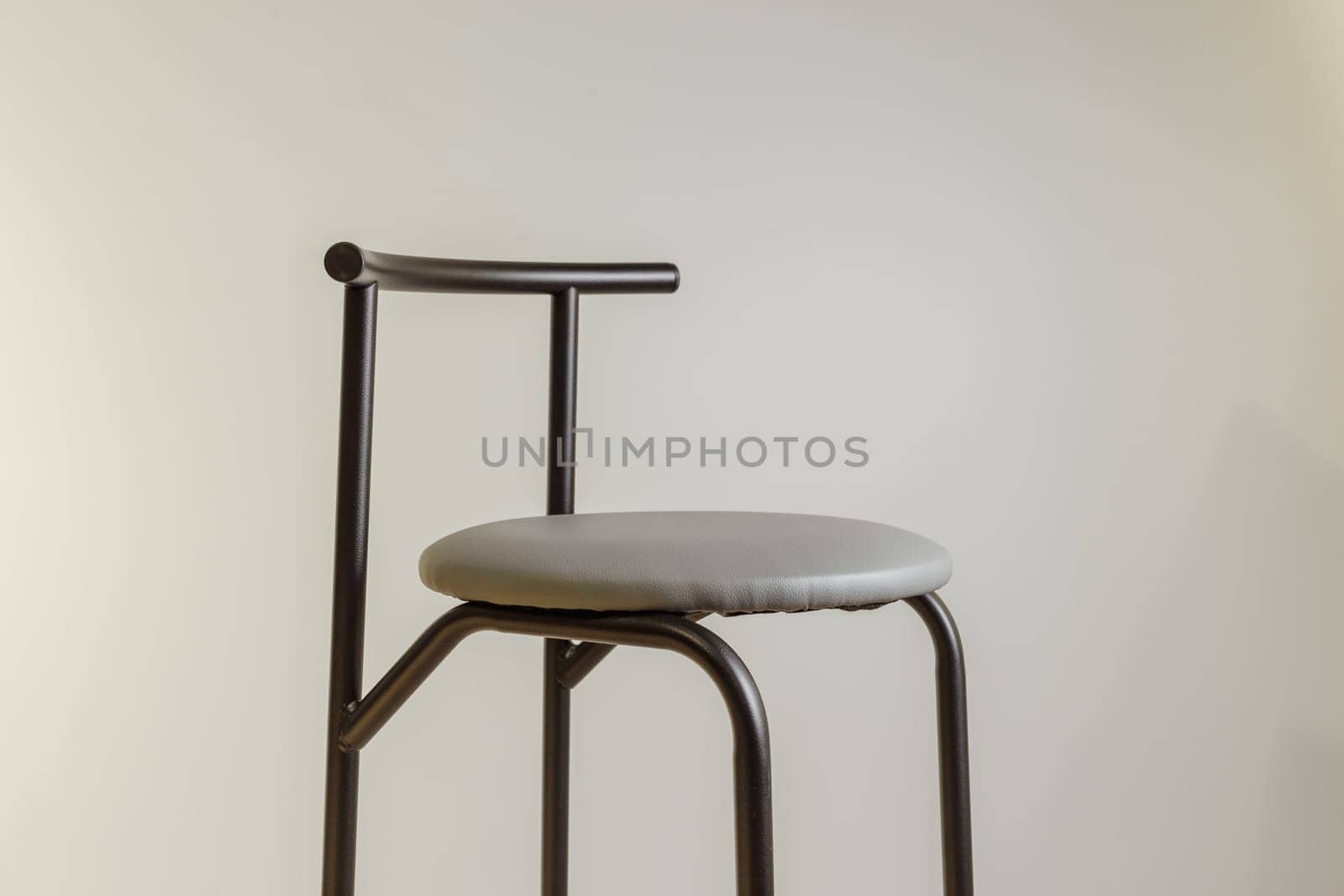 Steel legs simplistic bar chair.