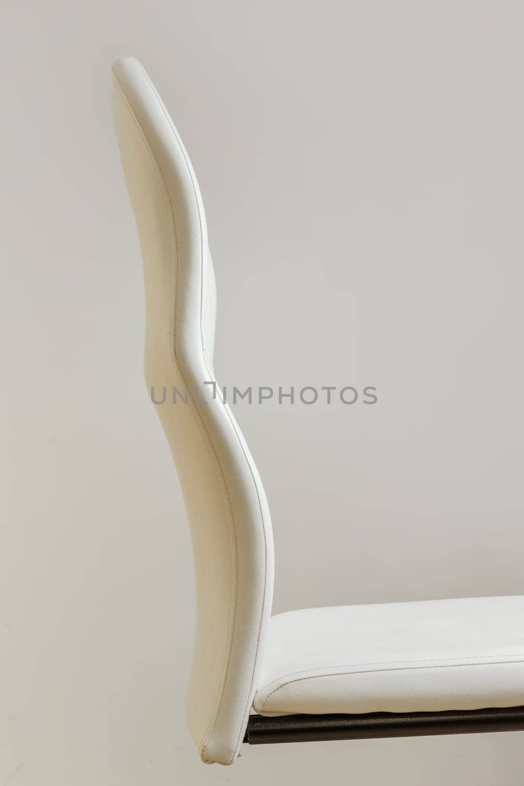 modern chair with anatomic back, side view