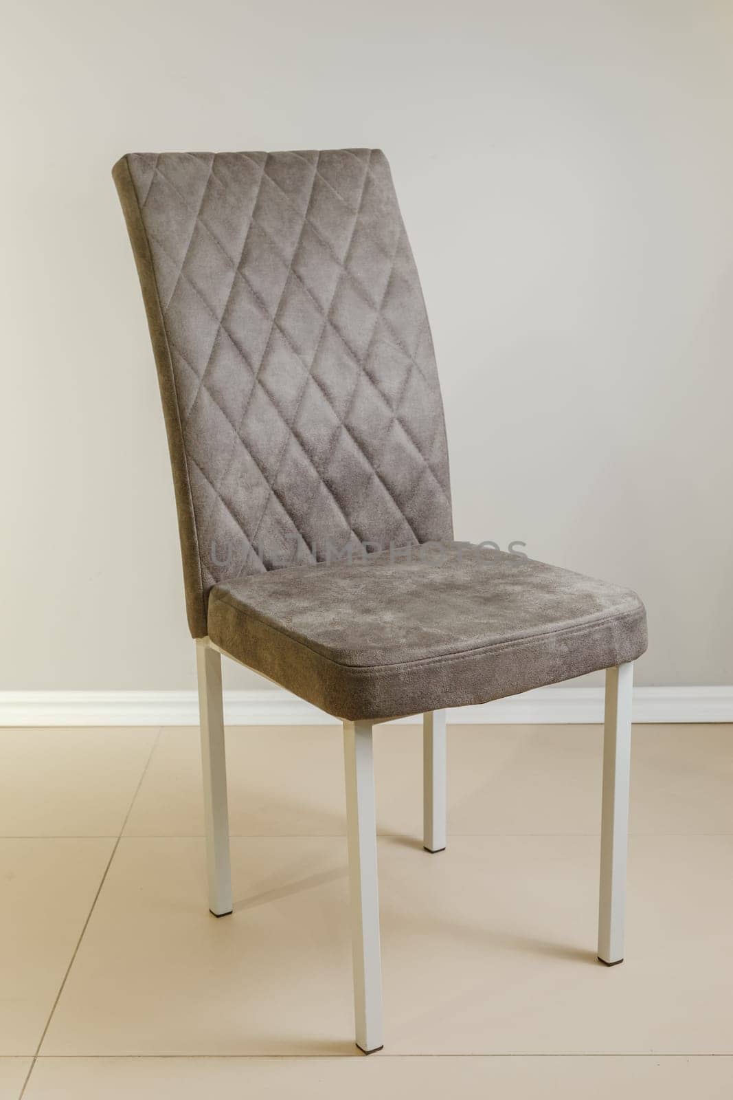 Contemporary modern kitchen armchair with velour upholstery.