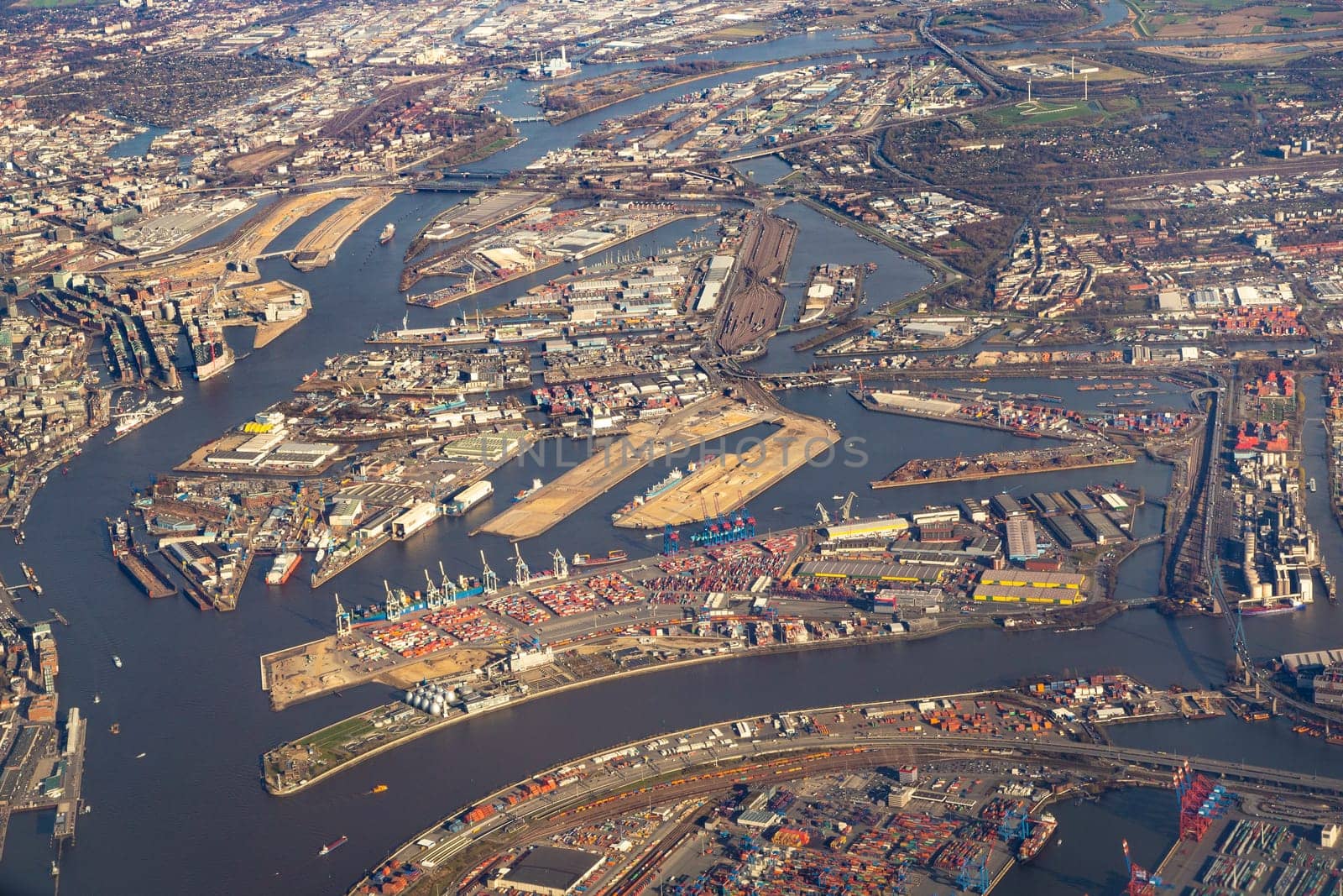 aerial of Hamburg harbor with river Elbe and docks