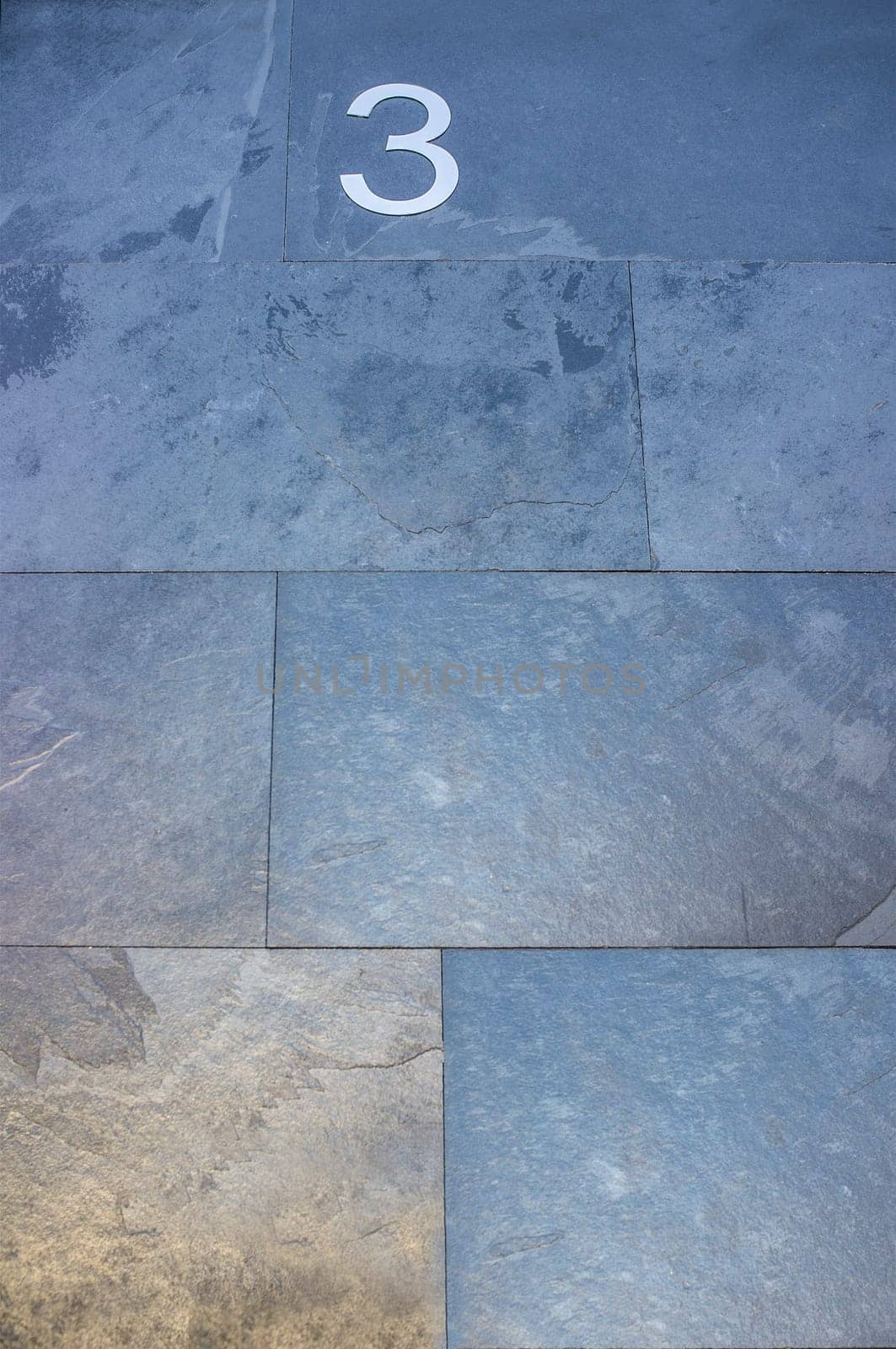 House number 3. Silver over black-blueish slate. Houses with personality concept