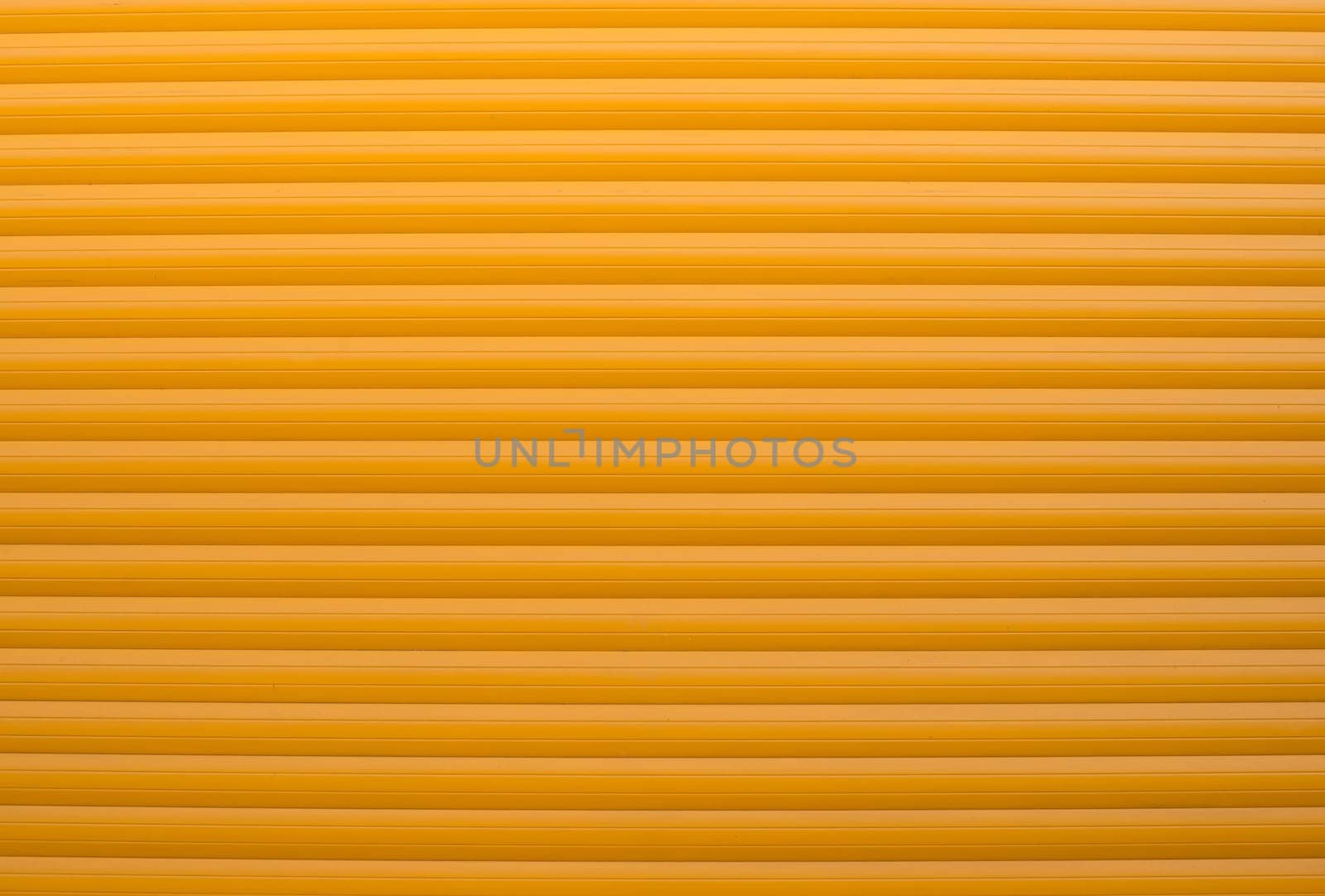 Textured wall structure, background with copy space for text, crunchy backdrop, orange window cover, close up