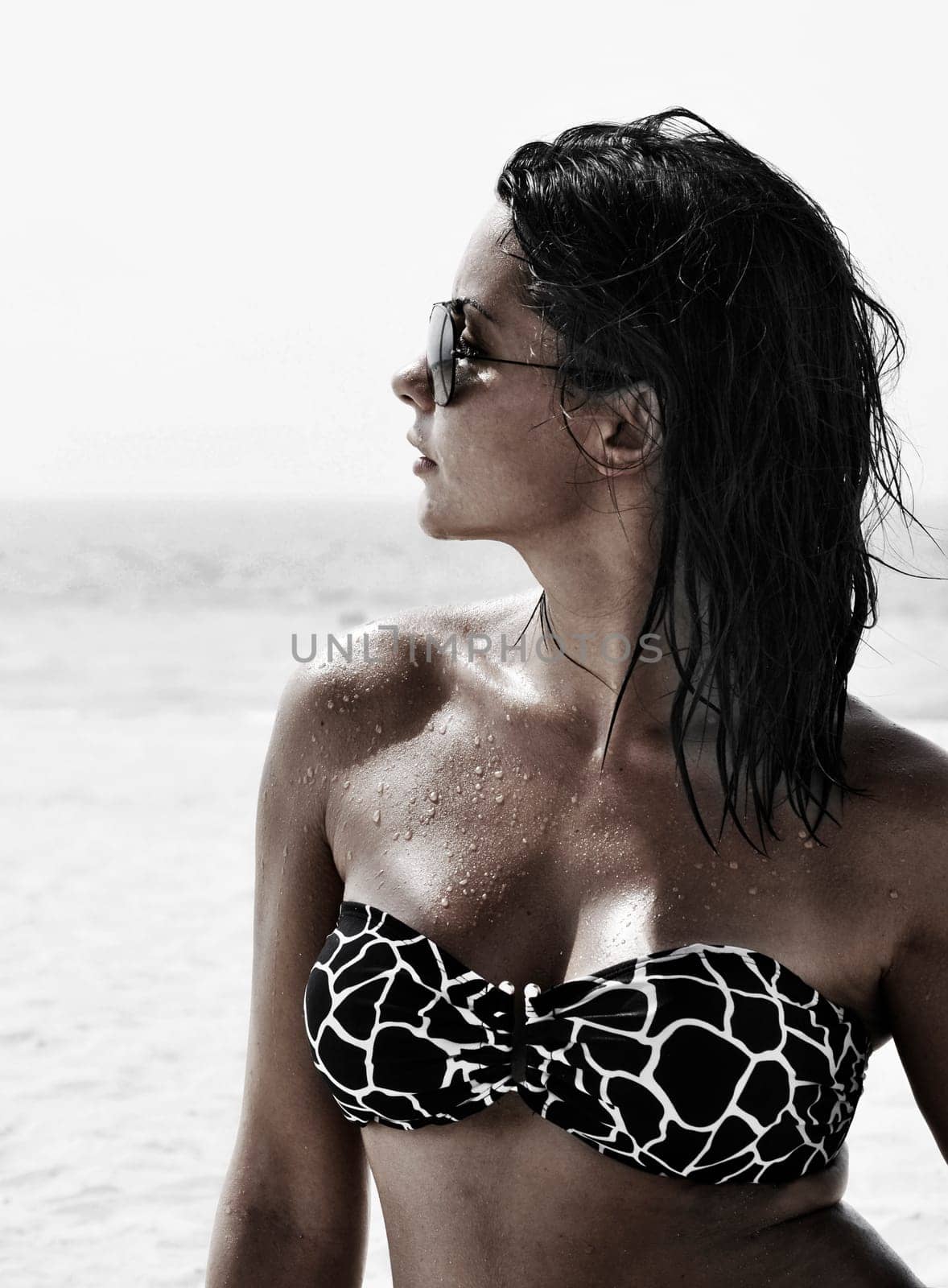 Fashion shot of beautiful woman on the beach in Dubai