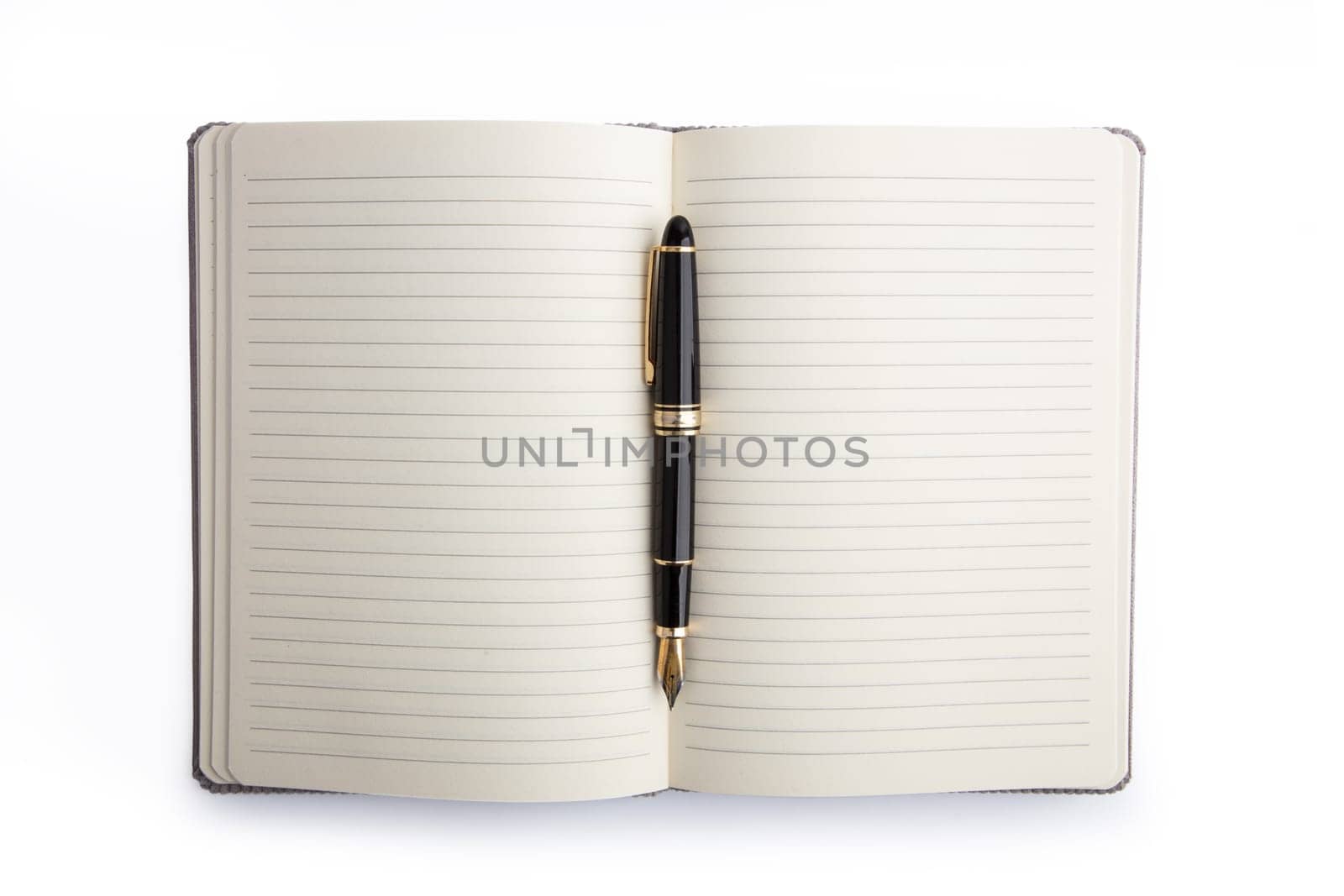 Blank book with lines and pen isolated on white background