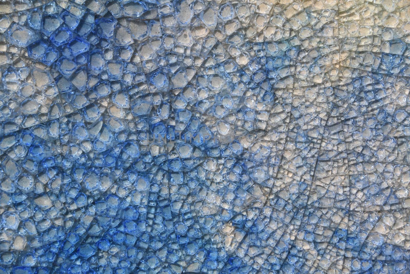 A blue,light blue,gray background made of glass
