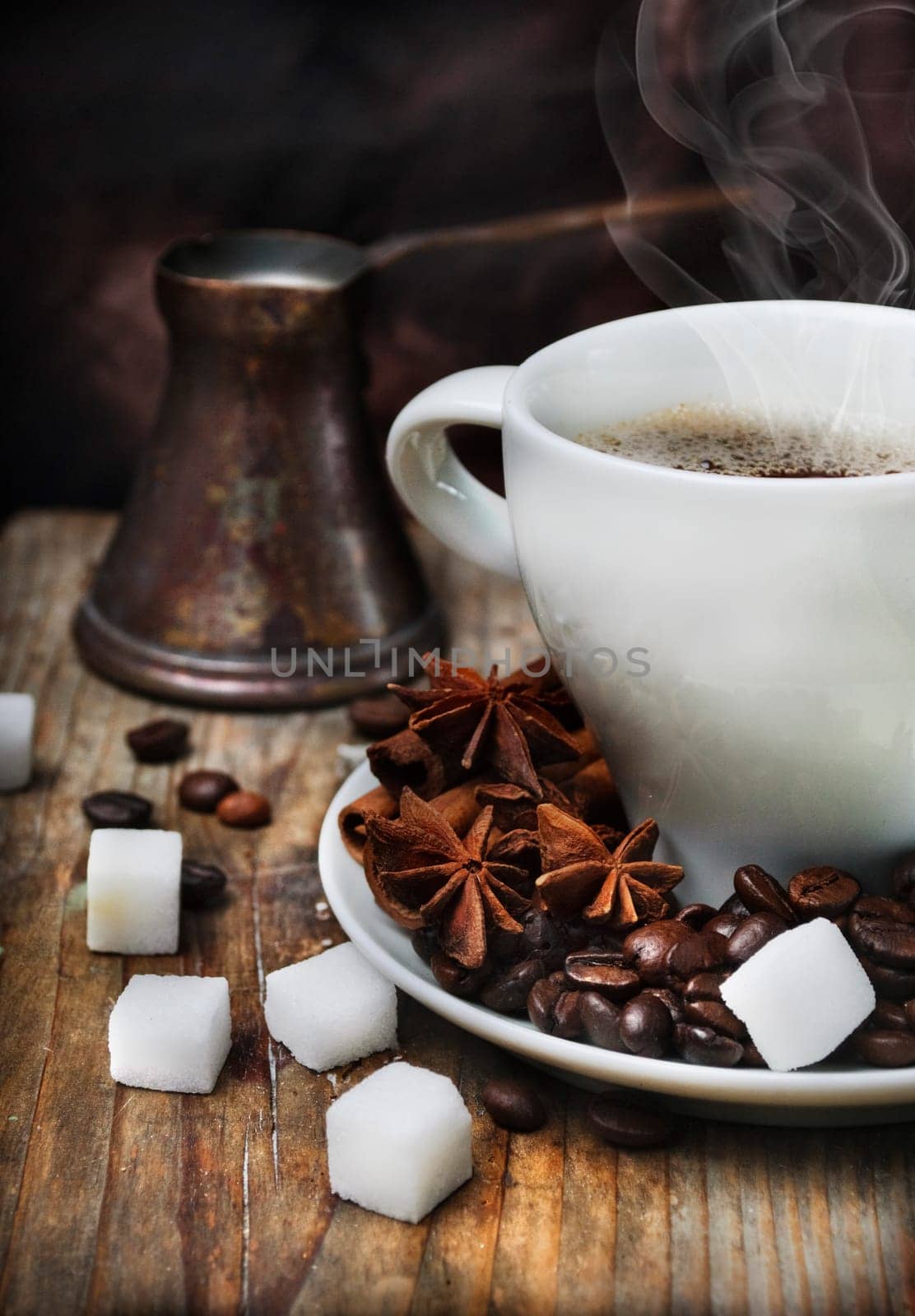 Coffee cup and old-fashion coffee pot on wooden plank