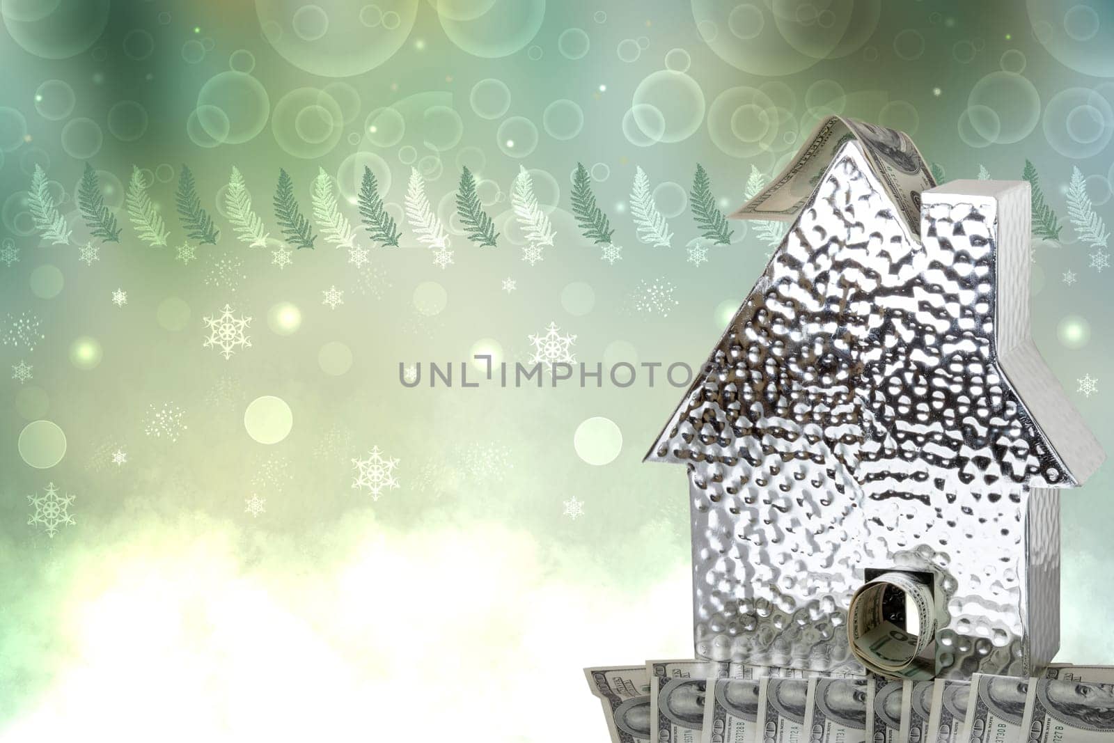 Business, money and finance concept. A metallic house model with many $100 banknotes against an abstract Christmas background. Real estate and saving plans for house. Space.