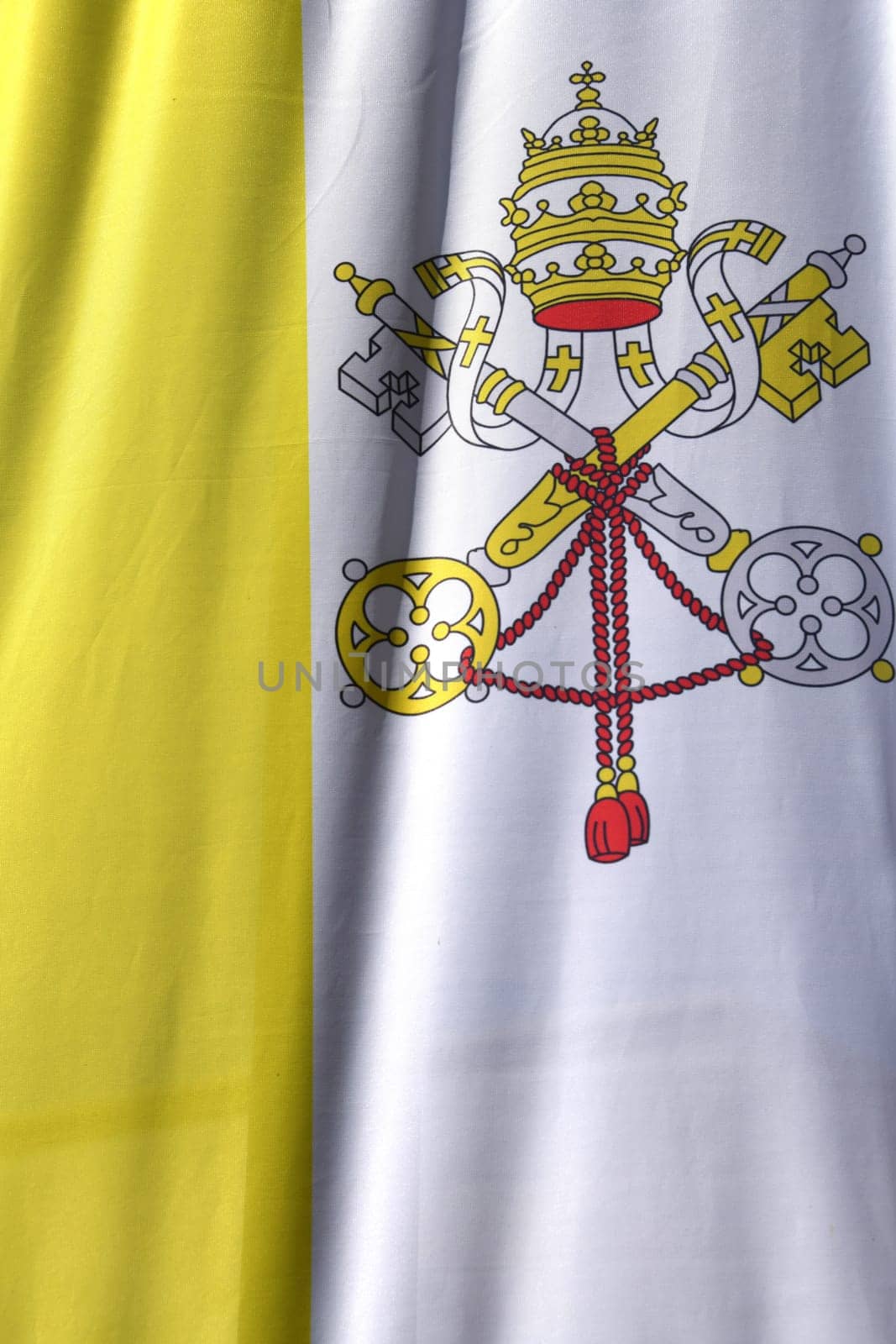 The flag of the Vatican City consists of two parallel vertical stripes: on the right a white,on the left a yellow. The flag is hoisted at major Catholic church festivals.