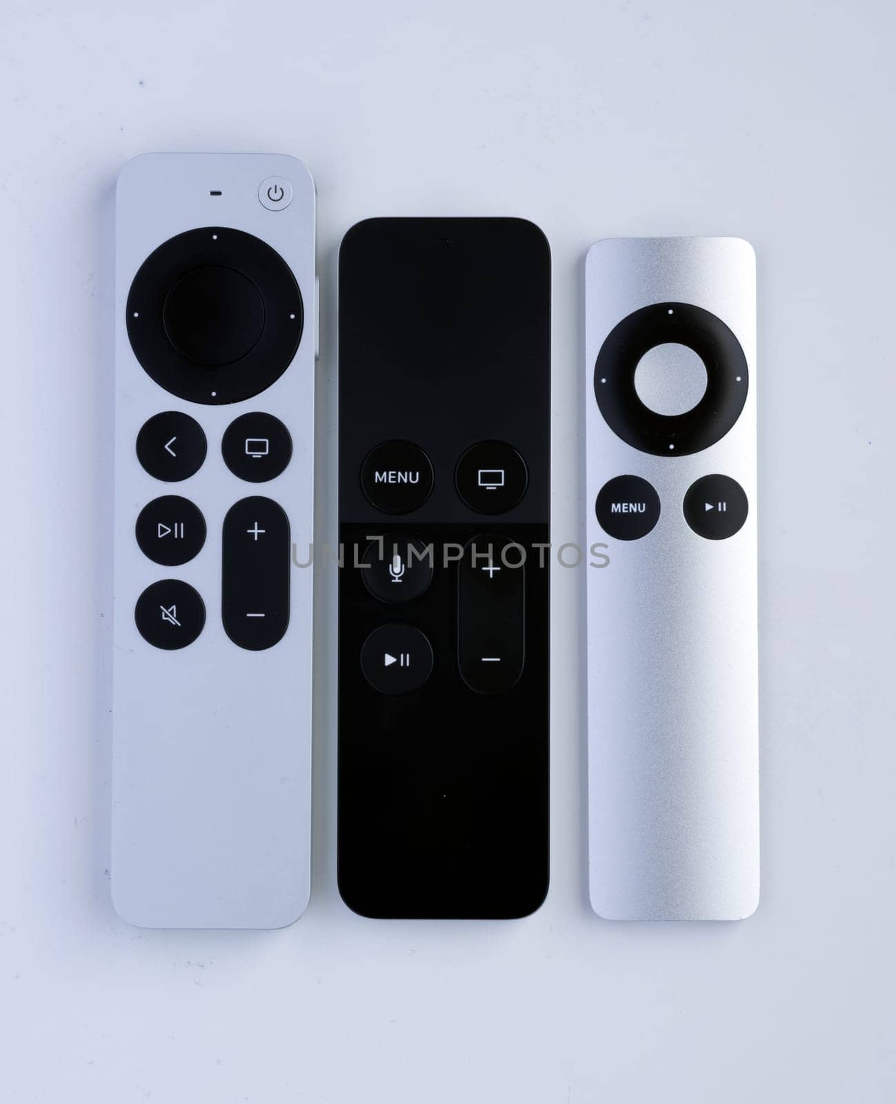 Calgary, Alberta, Canada. Nov 2, 2021. Different types of apple tv control remotes.