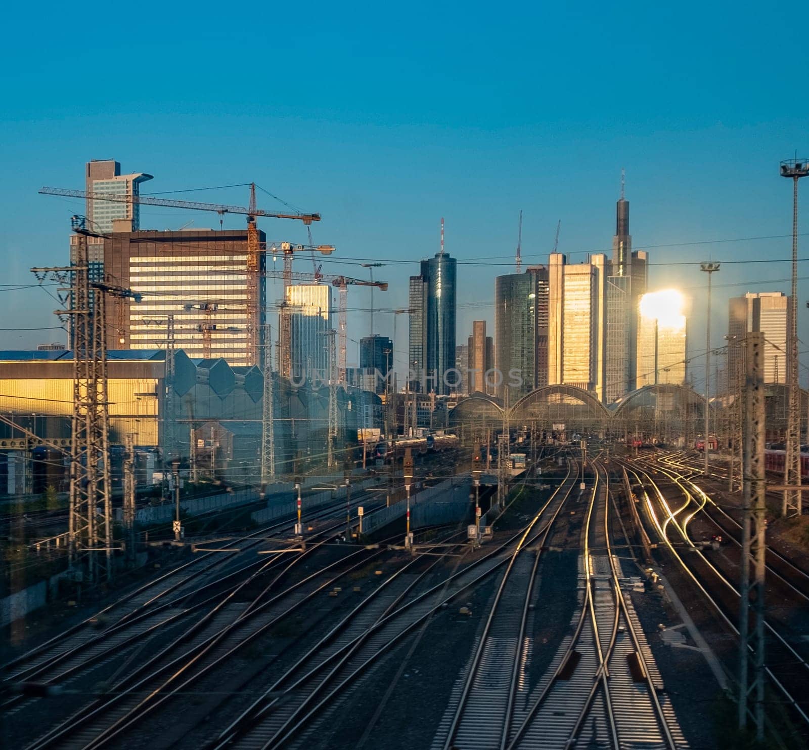 entering the frankfurt train station in sunset